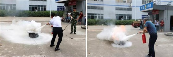 公司員工陸續(xù)上前操作滅火器滅火